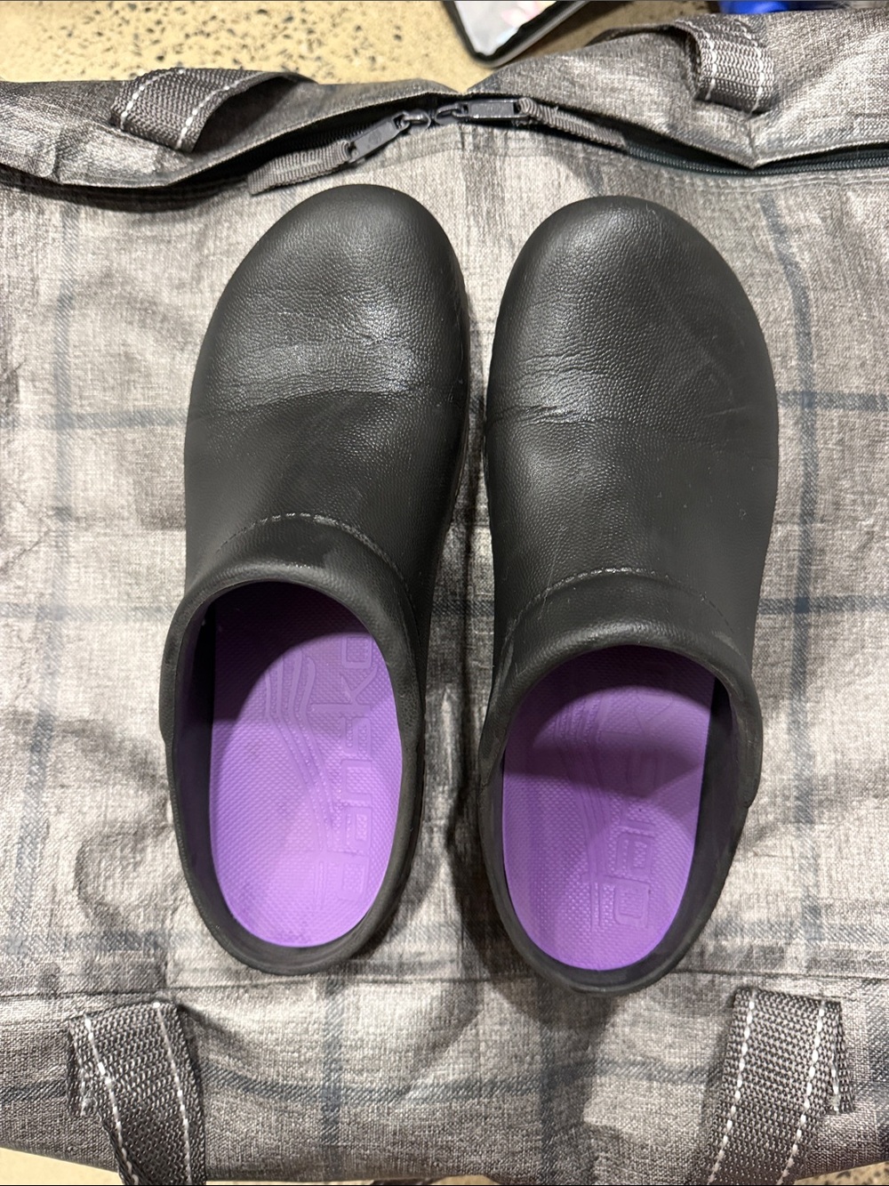 Dansko Black Leather Clogs with Purple Insole
